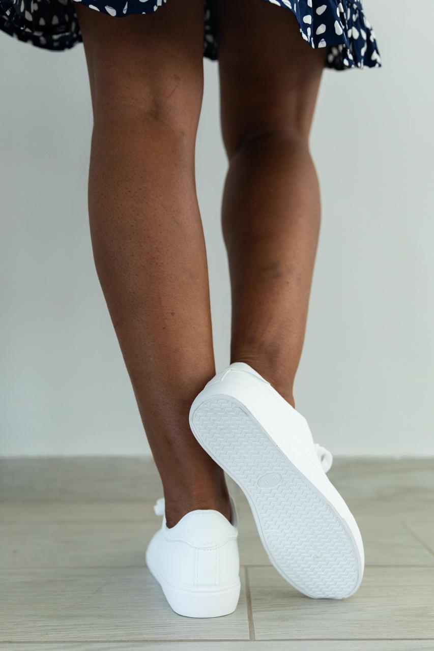 Essential White Everyday Sneakers. IMPORTANT: Runs small — please order ONE SIZE UP