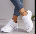 Ultra Comfortable White Sneaker with Gold Accent Strips