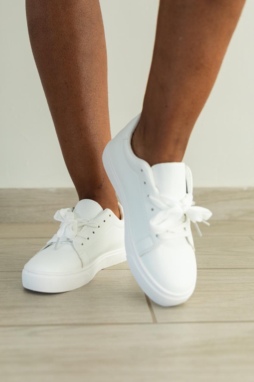 Essential White Everyday Sneakers. IMPORTANT: Runs small — please order ONE SIZE UP