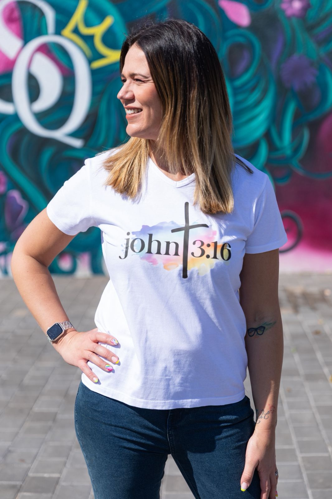 Faith in Fashion – Soft white ladies’ V-neck tees with a beautiful pastel watercolour splash background and bold faith declarations