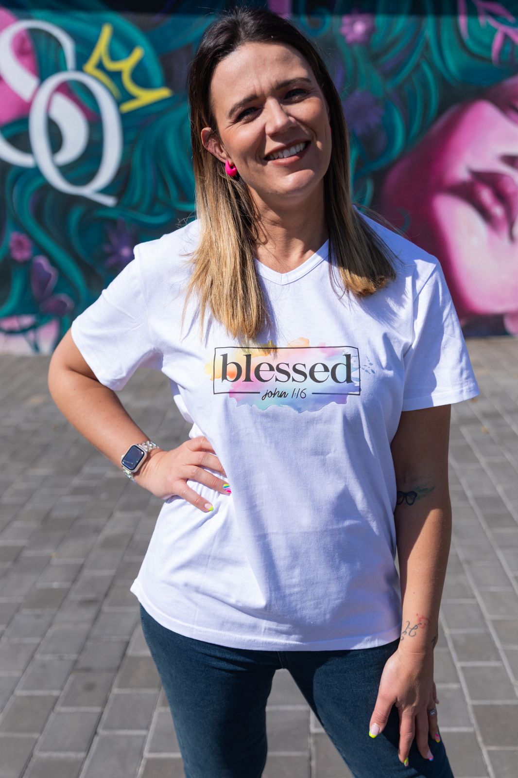 Faith in Fashion – Soft white ladies’ V-neck tees with a beautiful pastel watercolour splash background and bold faith declarations