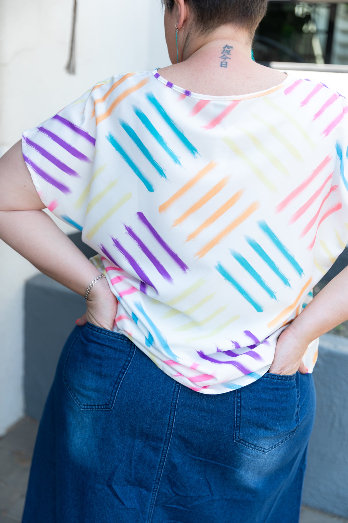 Curve-Rainbow-Brushstroke-tshirt-back-lifestyle