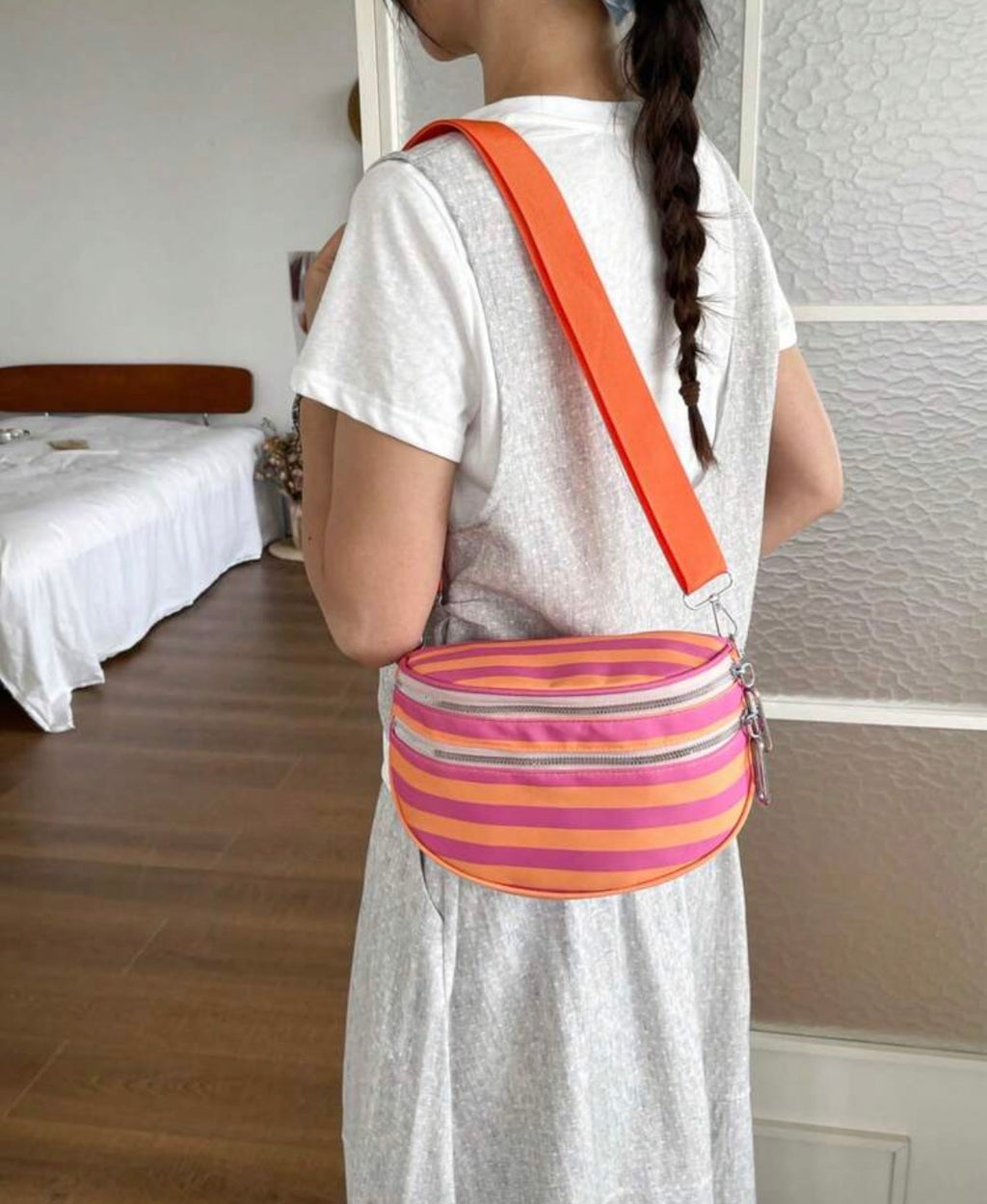 Orange-Pink-Striped-Litchi-Crossbody-Bag-side-lifestyle