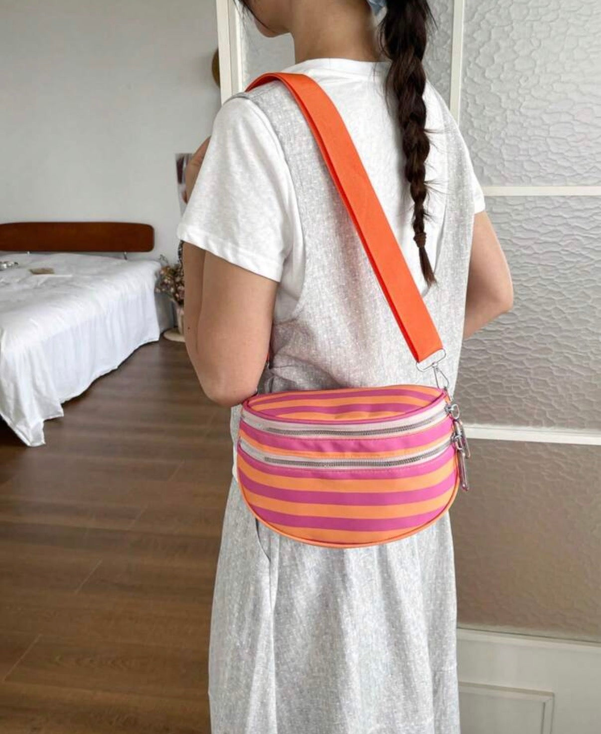 Orange-Pink-Striped-Litchi-Crossbody-Bag-side-lifestyle