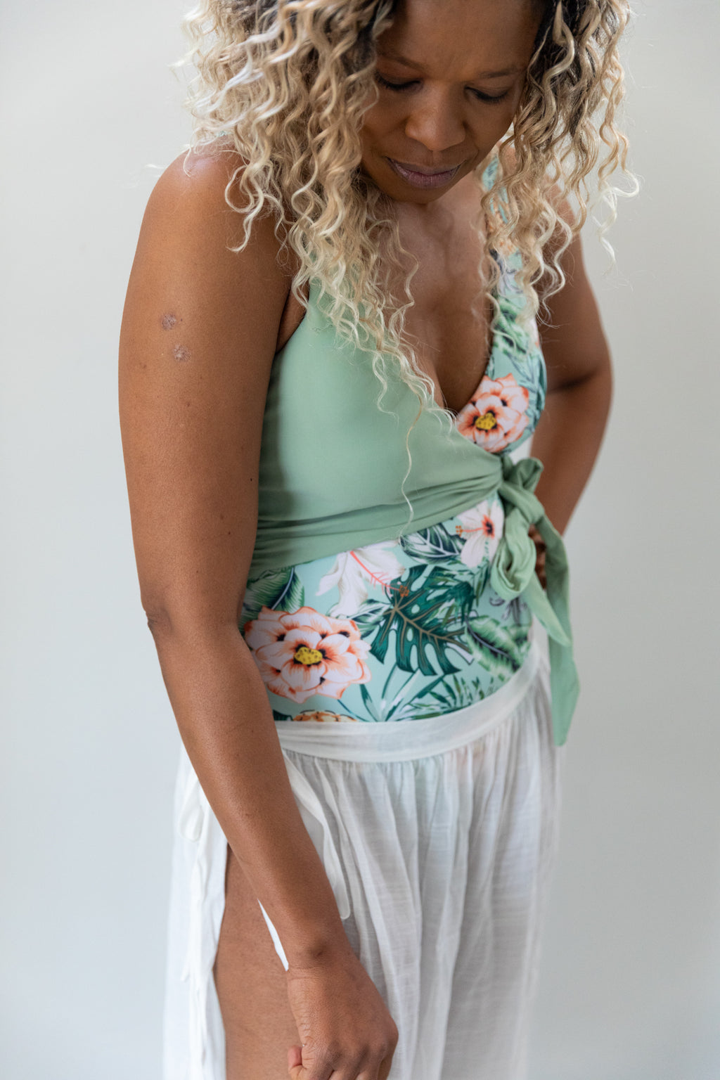 Tropical-Ruffle-One-Piece-Sage-Green-Floral-Print-swimsuit-lifestyle