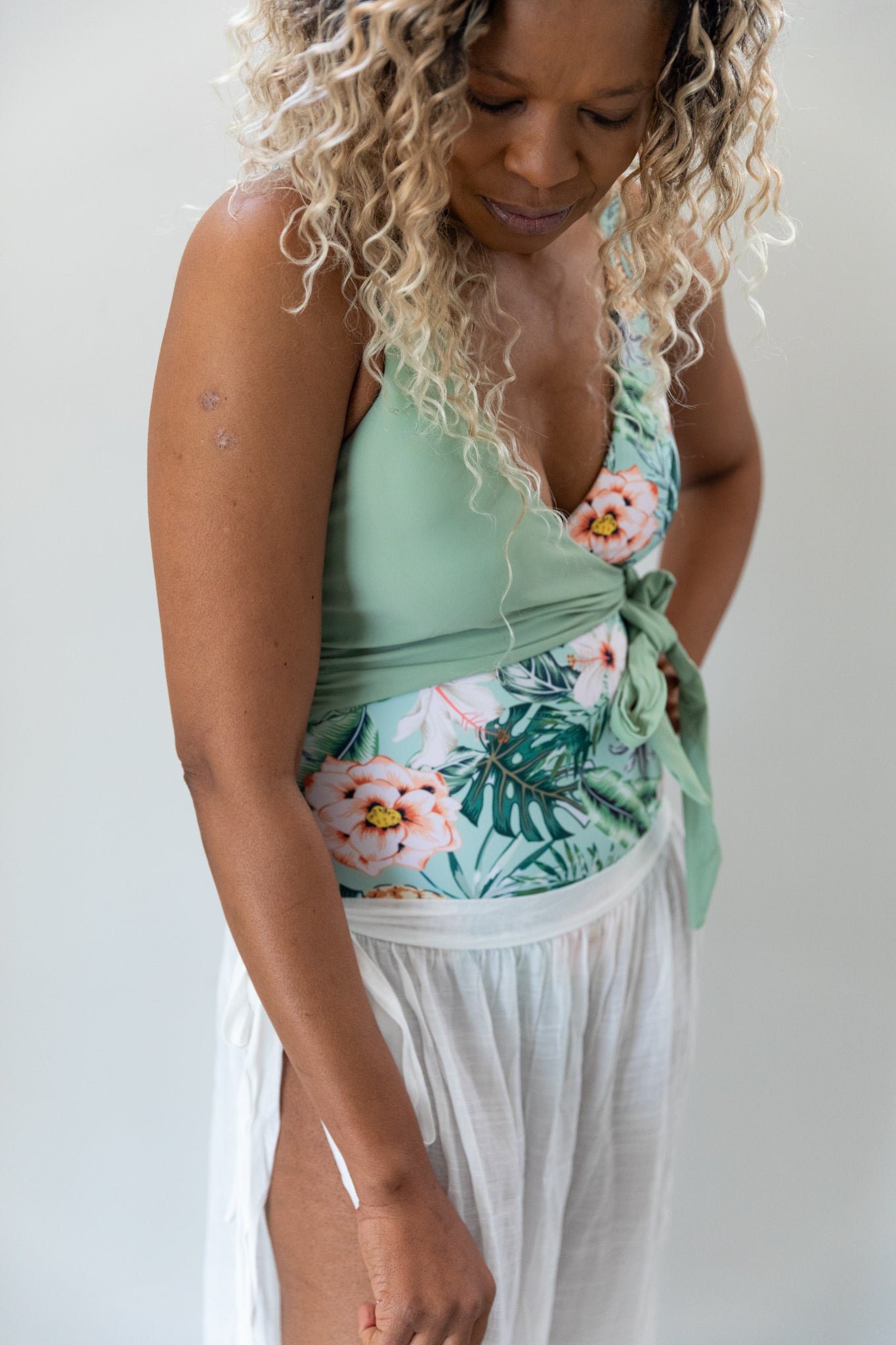 Tropical-Ruffle-One-Piece-Sage-Green-Floral-Print-swimsuit-lifestyle