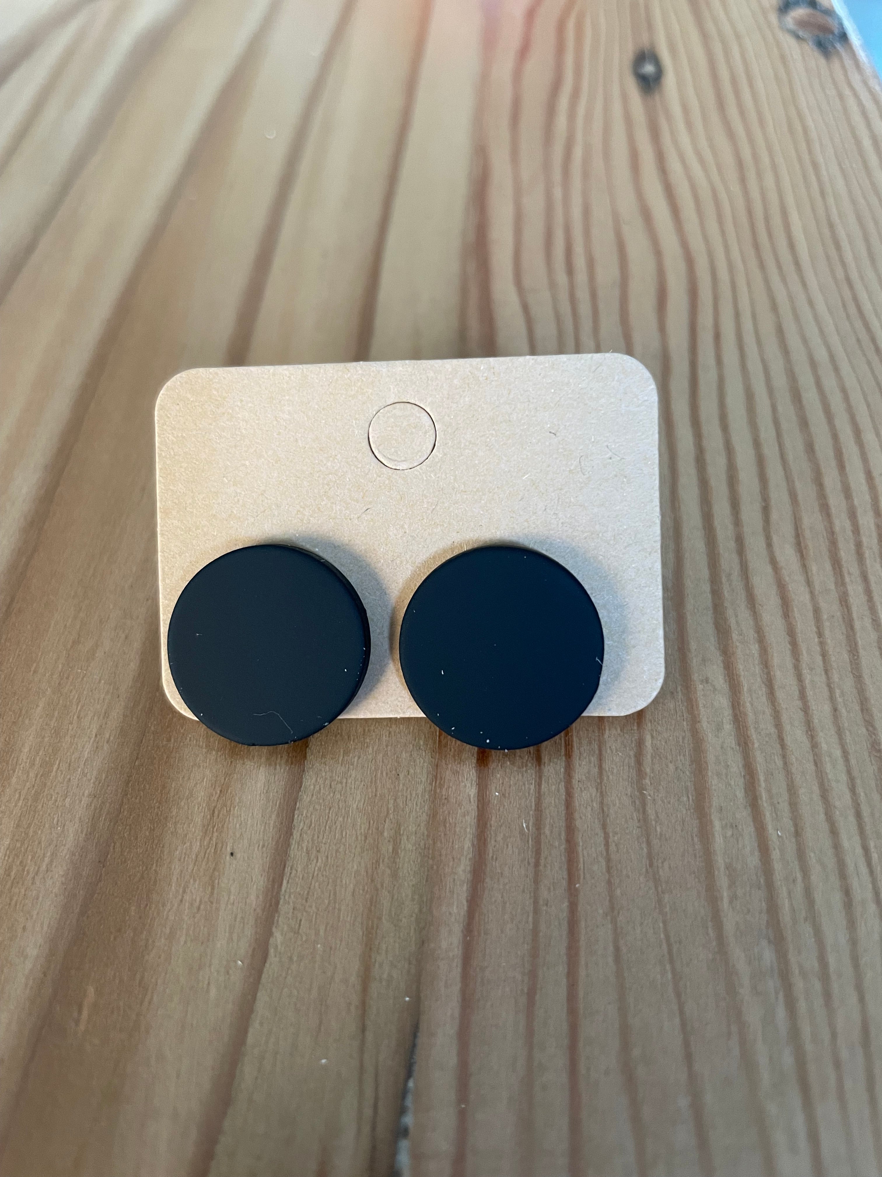 round-black-earings-front