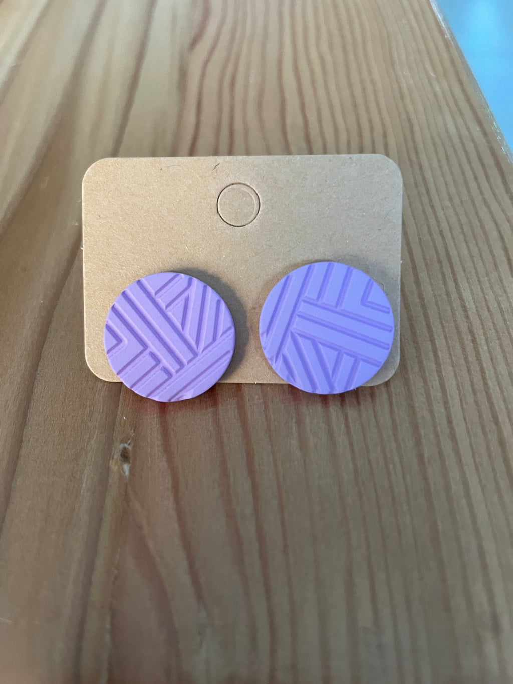 round-purple-earings-front